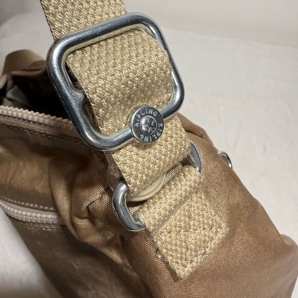 Kipling Gold Crossbody Bag with Adjustable Strap and Textured Finish - Picture 10 of 15